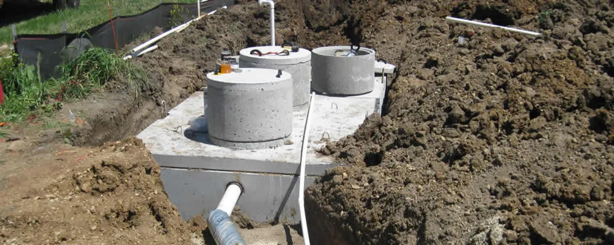 Septic system repair and installation site with tank access ports in Fort Worth, TX