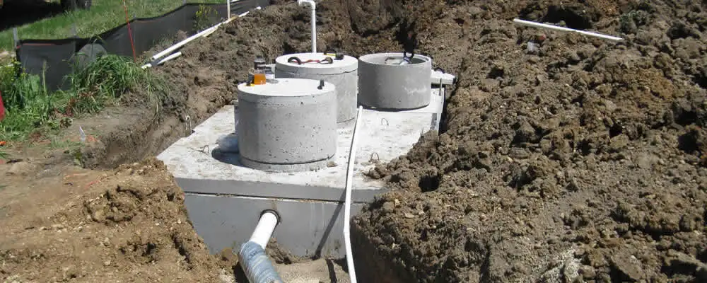 Septic system repair and installation site with tank access ports in Fort Worth, TX